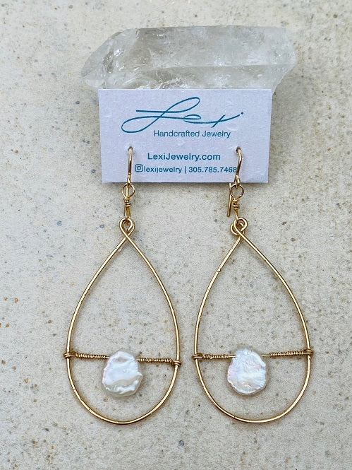 .Pear shaped Hoop Earrings with Oyster Pearls