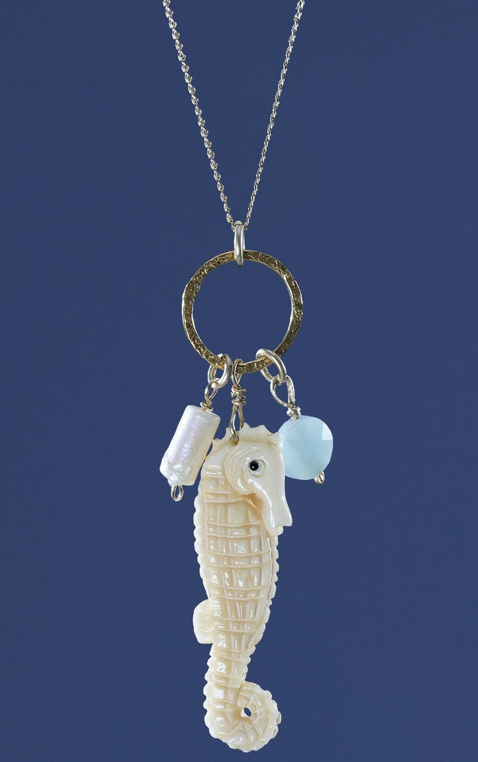 .Seahorse Necklace with a natural blue gemstone and Pearl tube